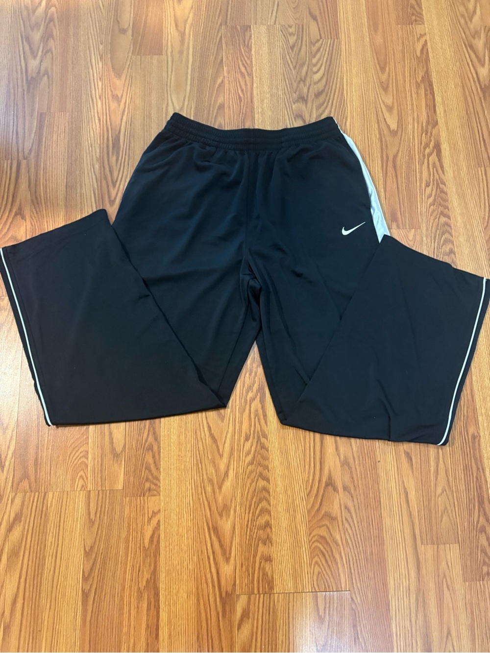 Nike Black Sweatpants with White Swoosh and Side Stripe